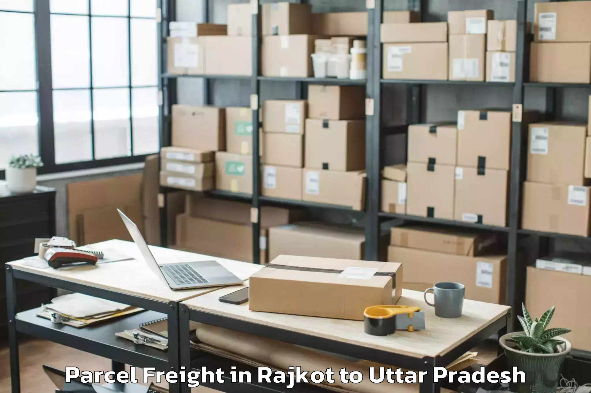 Top Rajkot to Fatehganj West Parcel Freight Available